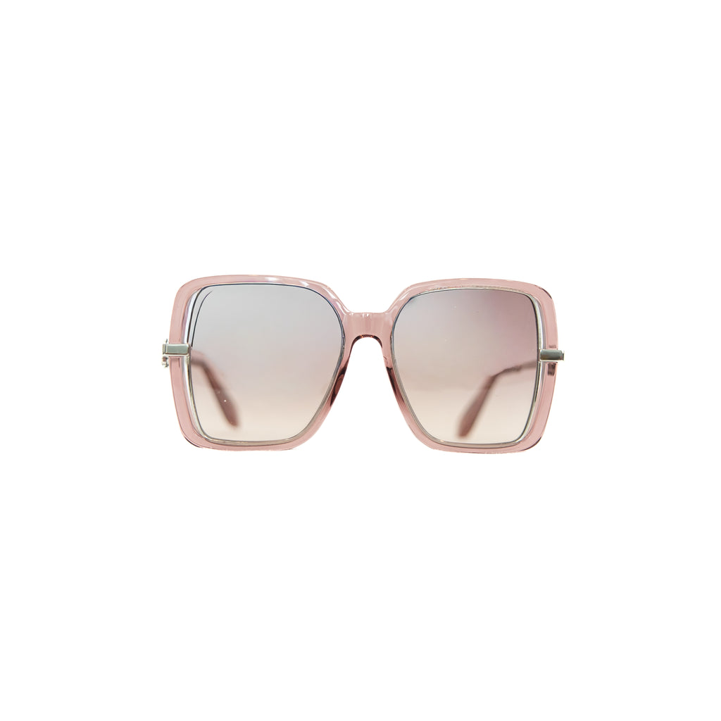 Roberto Cavalli SRC007 sunglasses with a transparent pink frame and brown gradient lenses